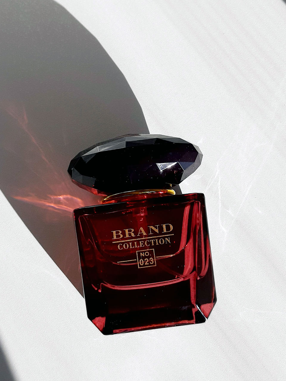 ادکلن برند کالکشن Brand Collection کد 023 رایحه Versace Crystal Noir حجم 25ml