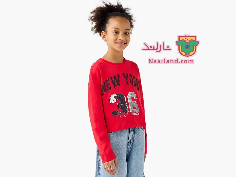 تیشرت کراپ آستین بلند نخی برند Juniors قرمز پولک برگردان new york 36