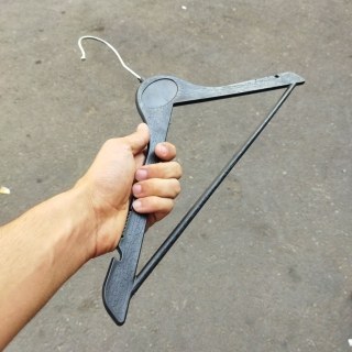 چوب لباسی طرح چوب مشکی