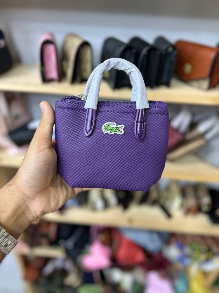 کیف زنانه مینی بگ چرمی ابعاد 14*12 بنفش برند لاگوست | مینی بگ دوشی دخترانه چرم | Purple Lacoste Mini Bag