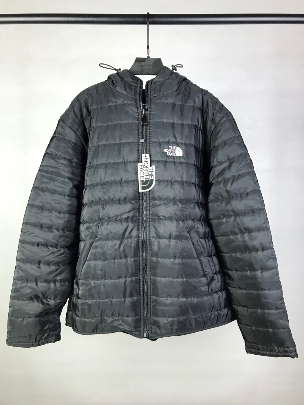 کاپشن The North face