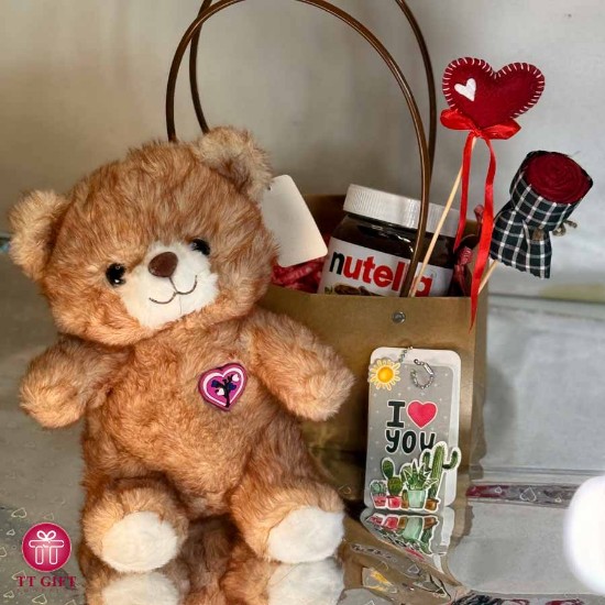 Chocolate package and lighted heart teddy bear