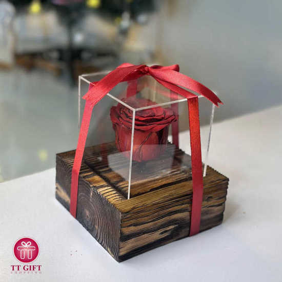 The Eternal Red Rose with a wooden base