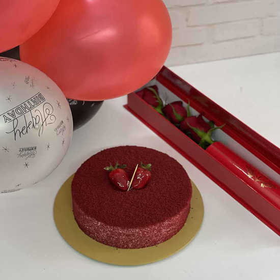 package of roses Box and redvelvet cake and balloons