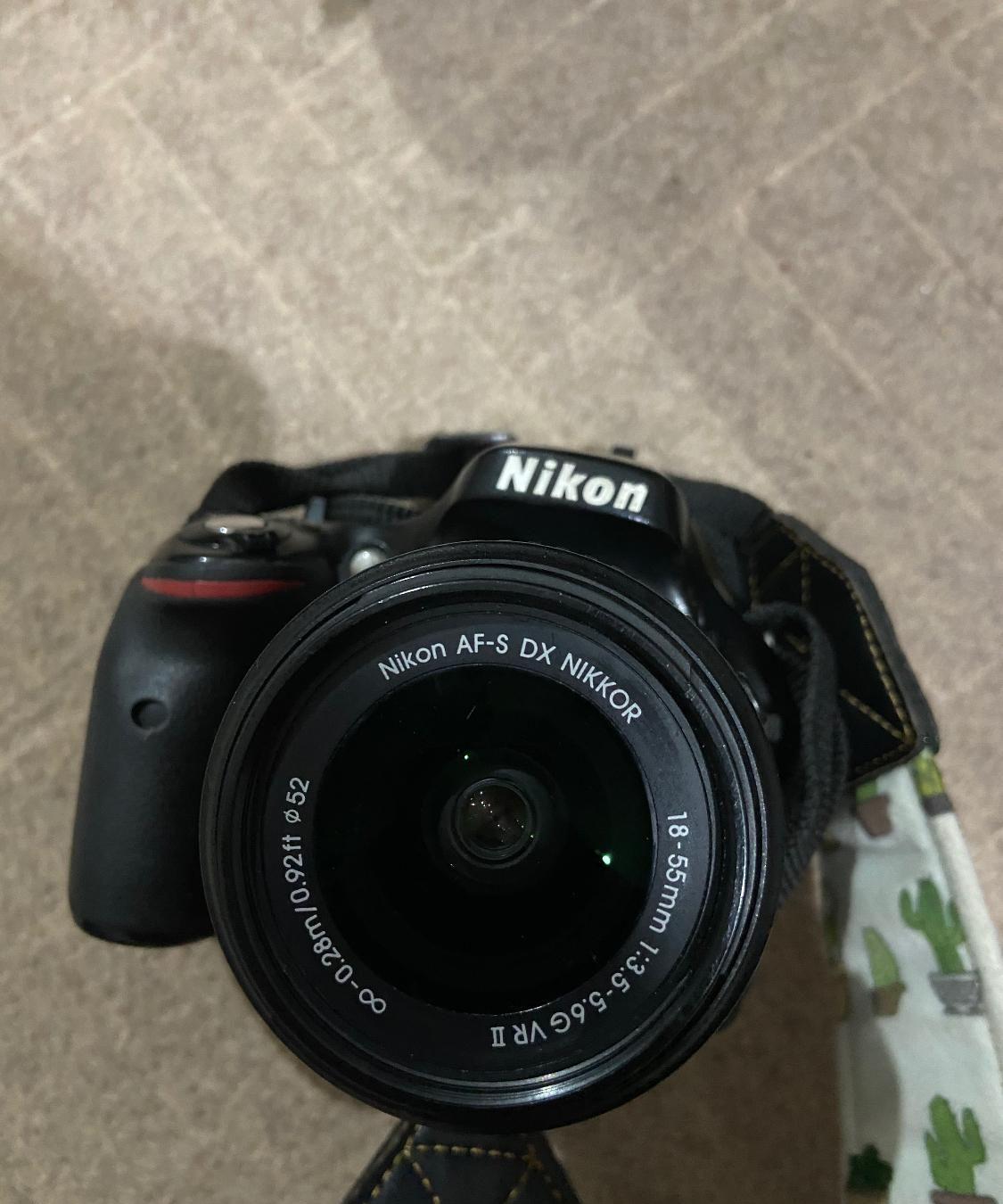 دوربین Nikon D5200 همراه با لنز اصلی 18-55mm