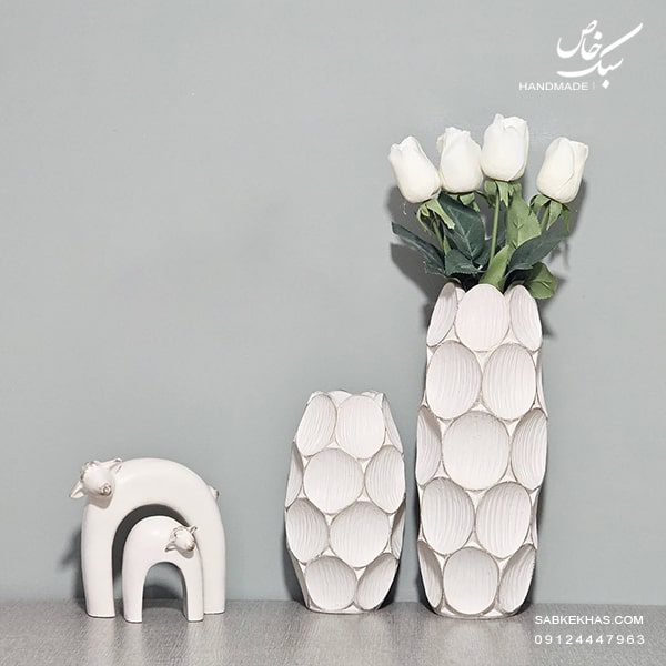 گلدان سکه ای و مجسمه