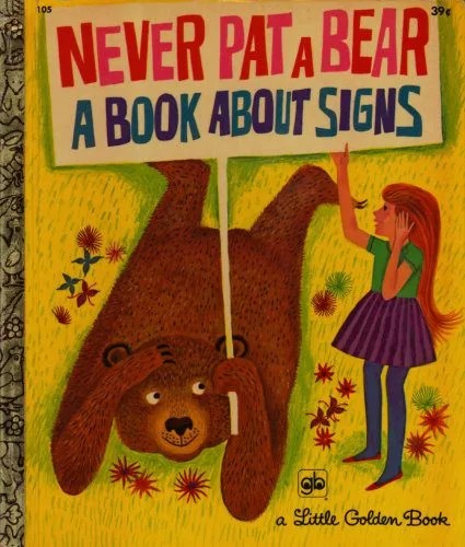 دانلود نسخه کامل کتاب Never Pat a Bear – A Book About Signs