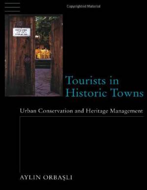 دانلود کتاب Tourists in Historic Towns: Urban Conservation and Heritage Management
